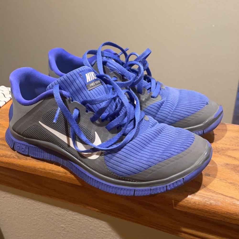 Purple and grey Women’s Nike Frees.